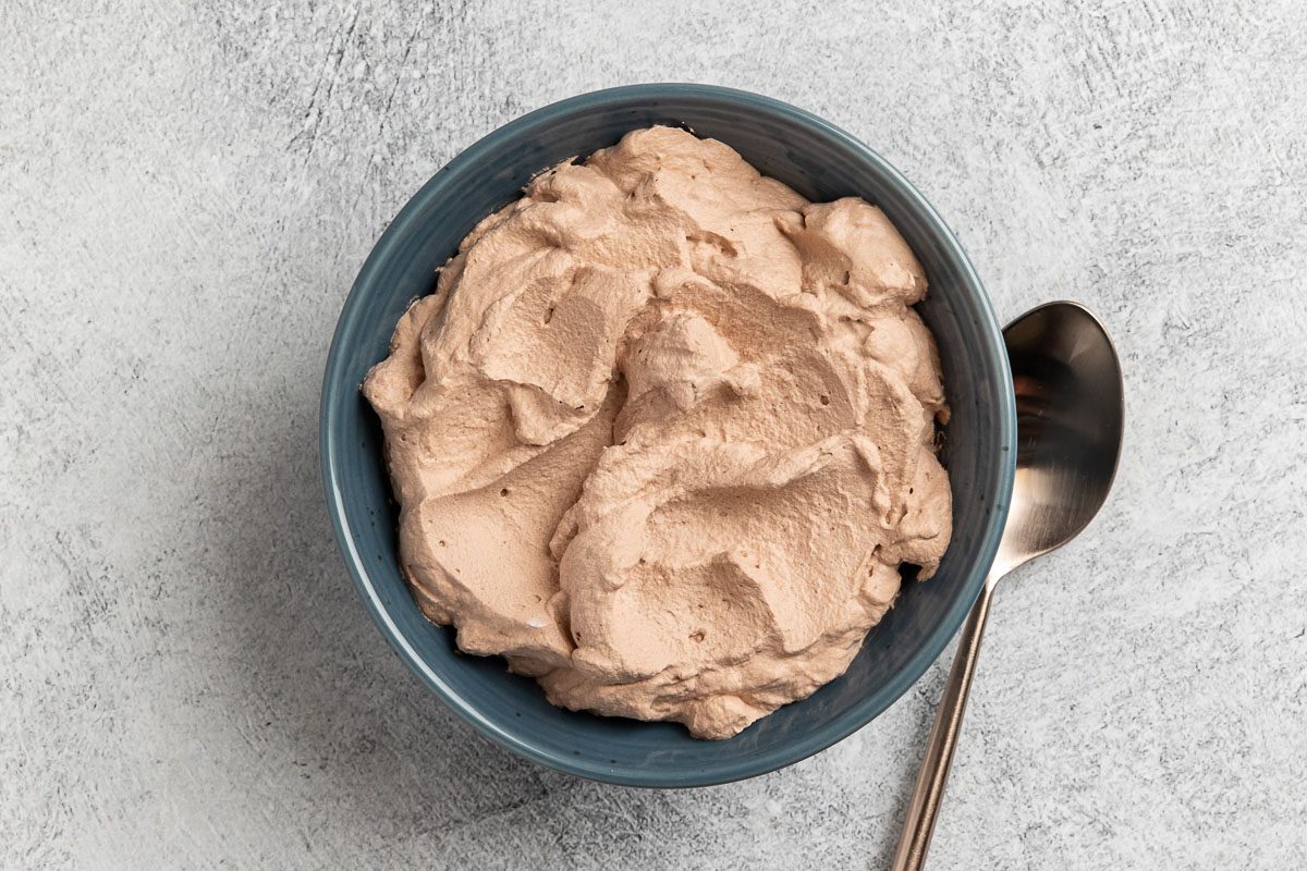 Taste of Home photo Coffee Whipped Cream recipe photo of the finished recipe in a serving bowl.