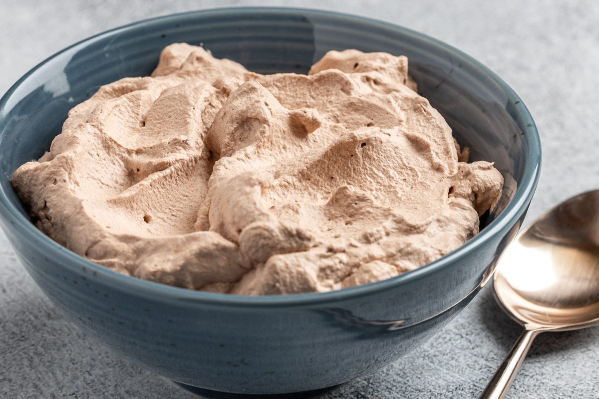 Taste of Home photo Coffee Whipped Cream recipe photo of the finished recipe in a serving bowl.