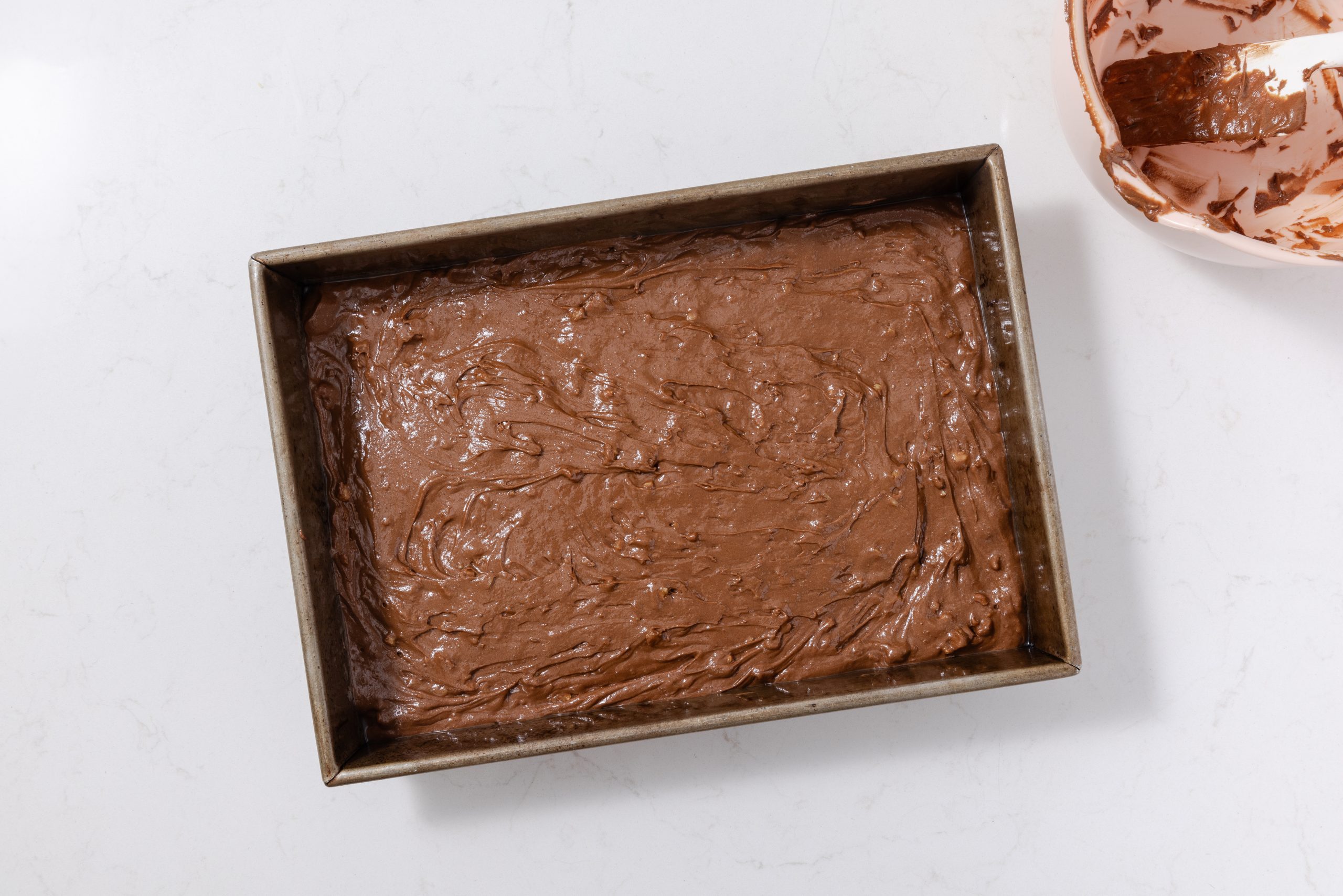 Brownie layer ready to be baked.