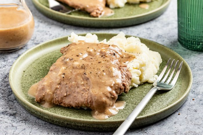Taste of Home Cubed Steak in Crock Pot recipe photo of the finished recipe served on plates.