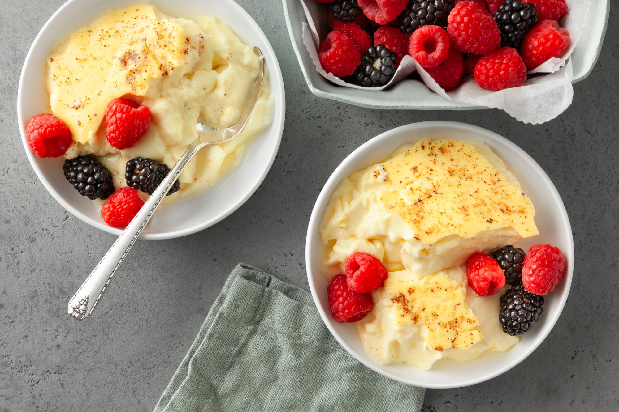 wide shot of get well custard served with berries