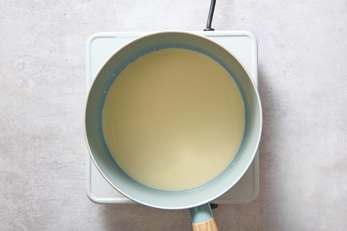 Warming the eggnog in a saucepan