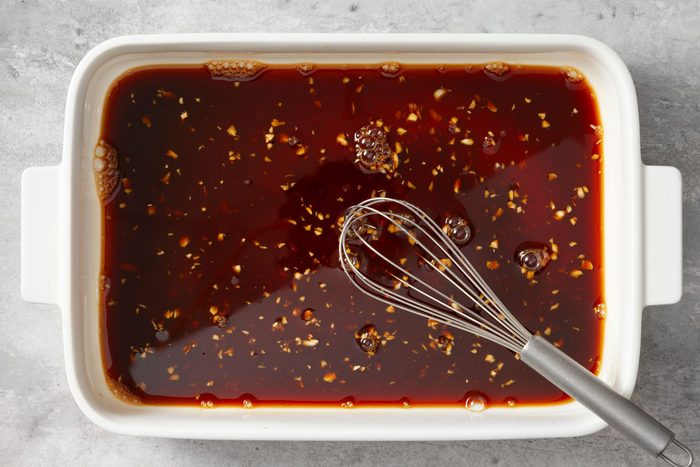 In a large dish or shallow bowl, combine the soy sauce, lemon juice, honey and garlic