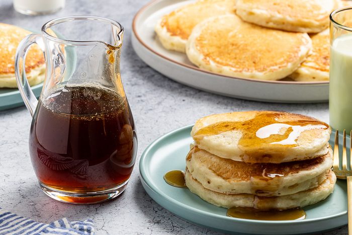 Taste of Home Homemade Pancake Syrup recipe photo of the finished recipe with pancakes.