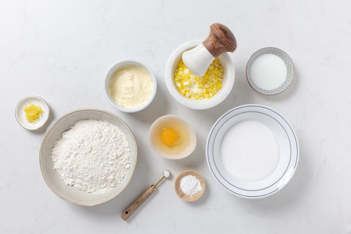 Ingredients for lemon drop cookies on kitchen counter.