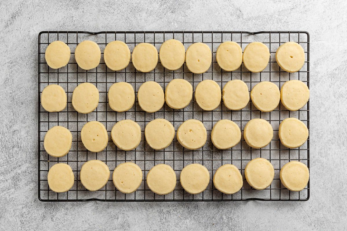 Taste of Home Lemon Meltaway Cookies recipe photo the cookies baked and cooling on a rack.