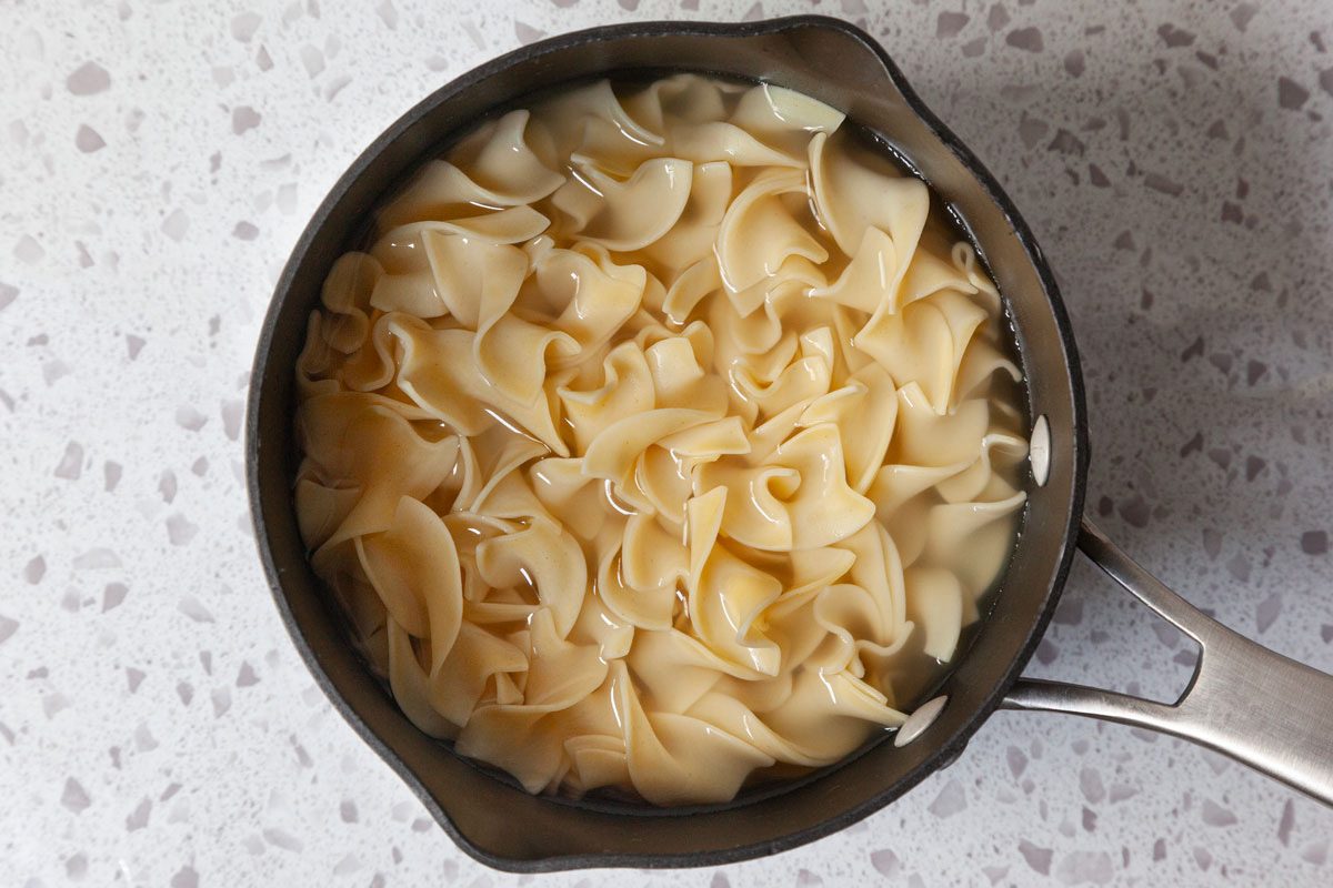 Step 1 of Taste of Home Meatball Stroganoff is to boilk the pasta according to package directions and drain