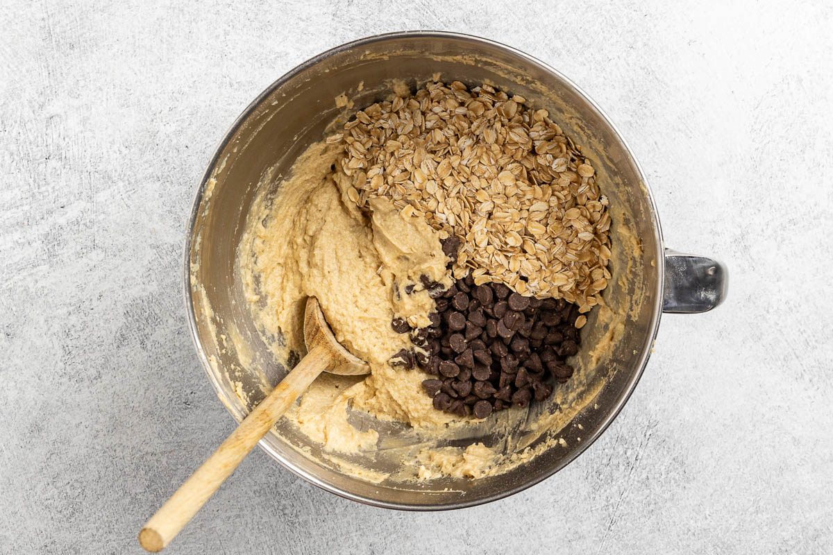 Taste of Home Oatmeal Chocolate Chip Muffins recipe photo of folding in the oats and chocolate chips into the muffin batter.