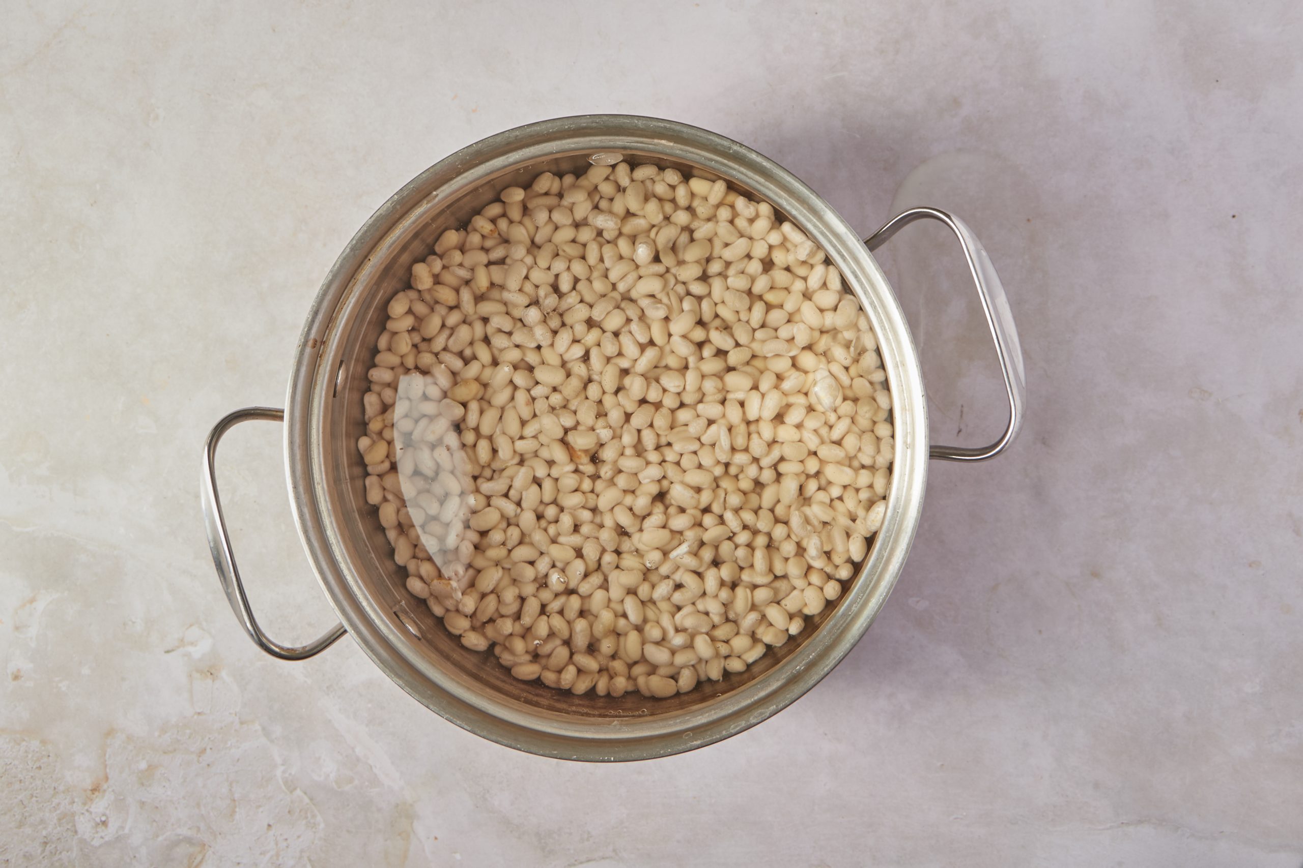 Cook the beans for vegan baked beans.