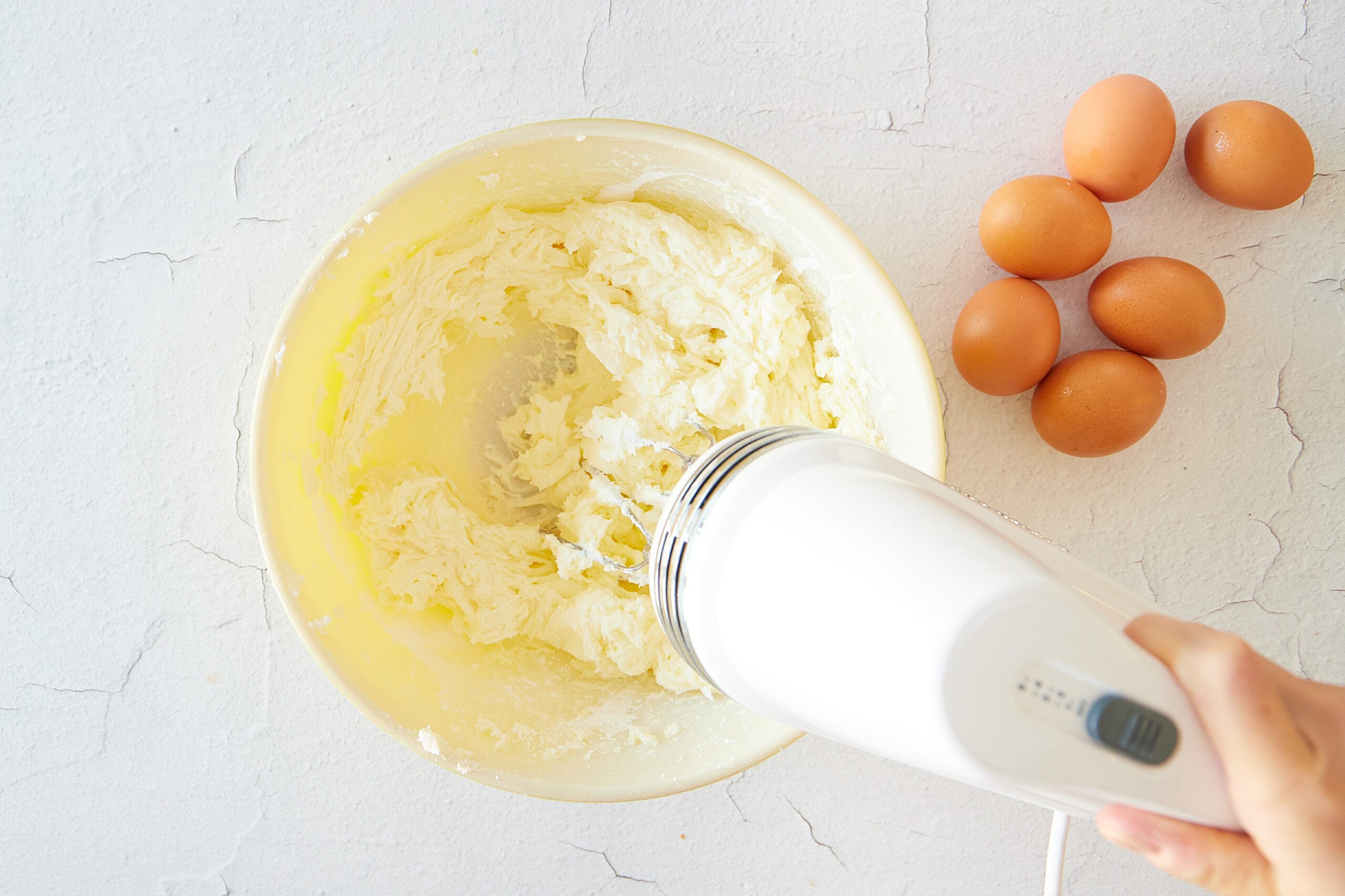Mix the batter for almond pound cake