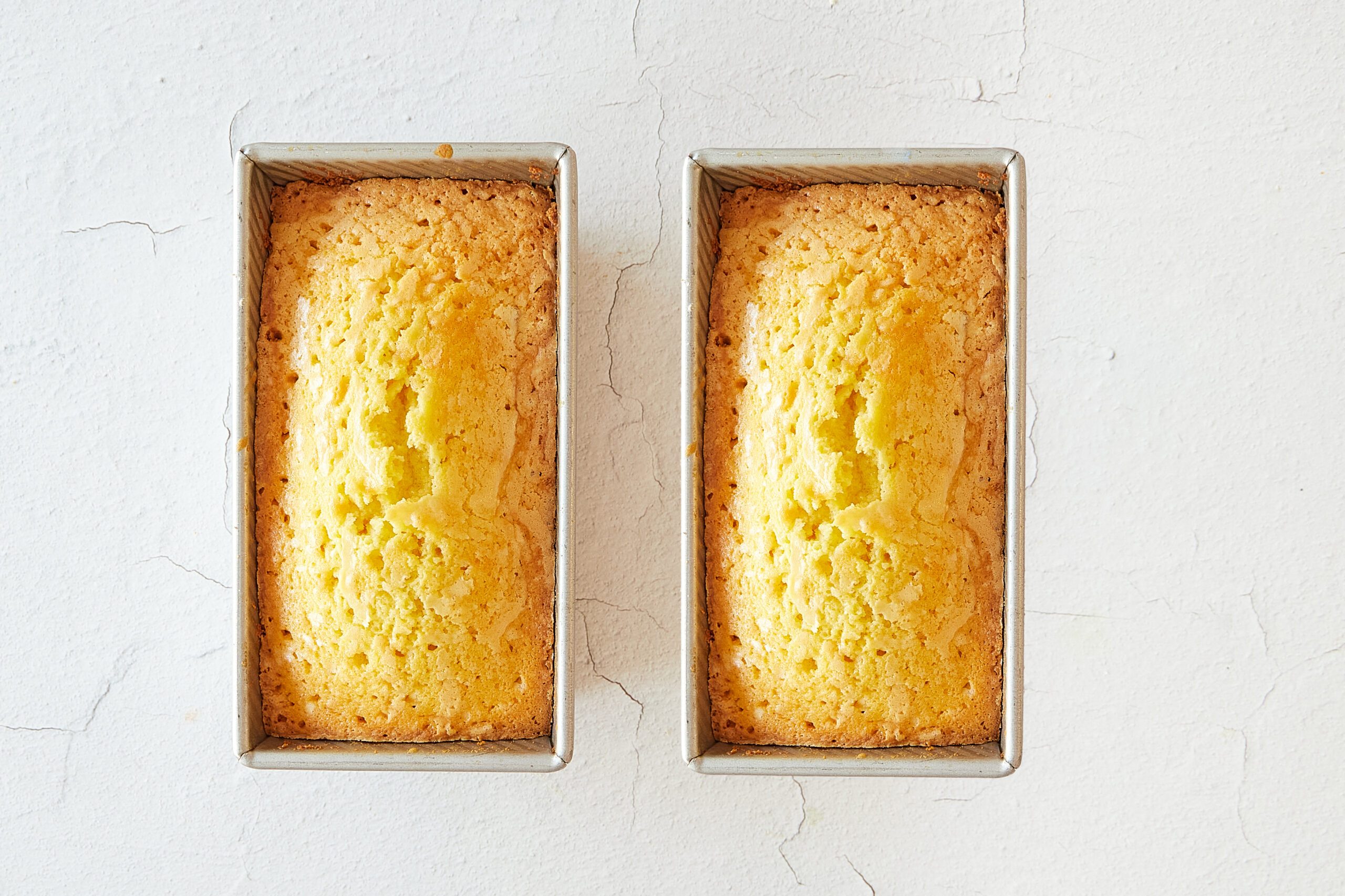Prepare the pans and bake the almond pound cake