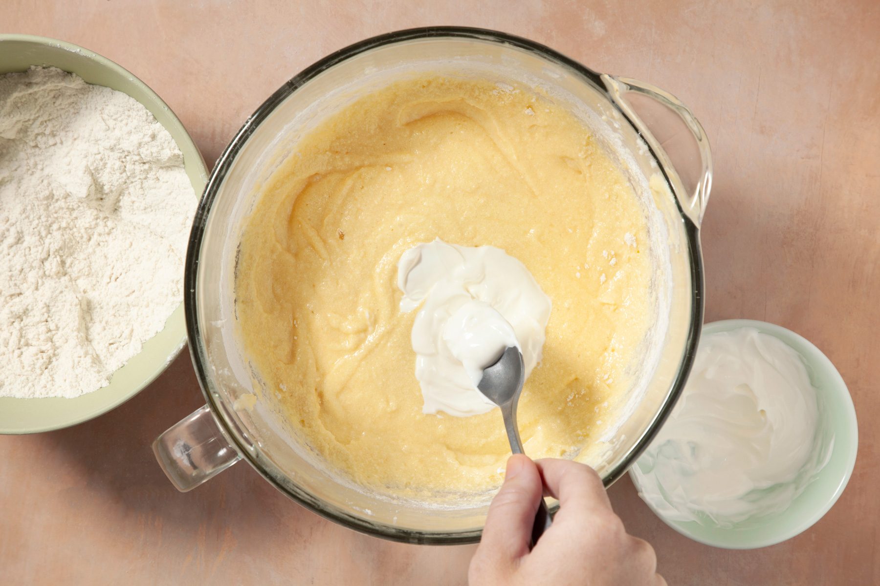 Top view shot of adding flour mixture to the butter mixture