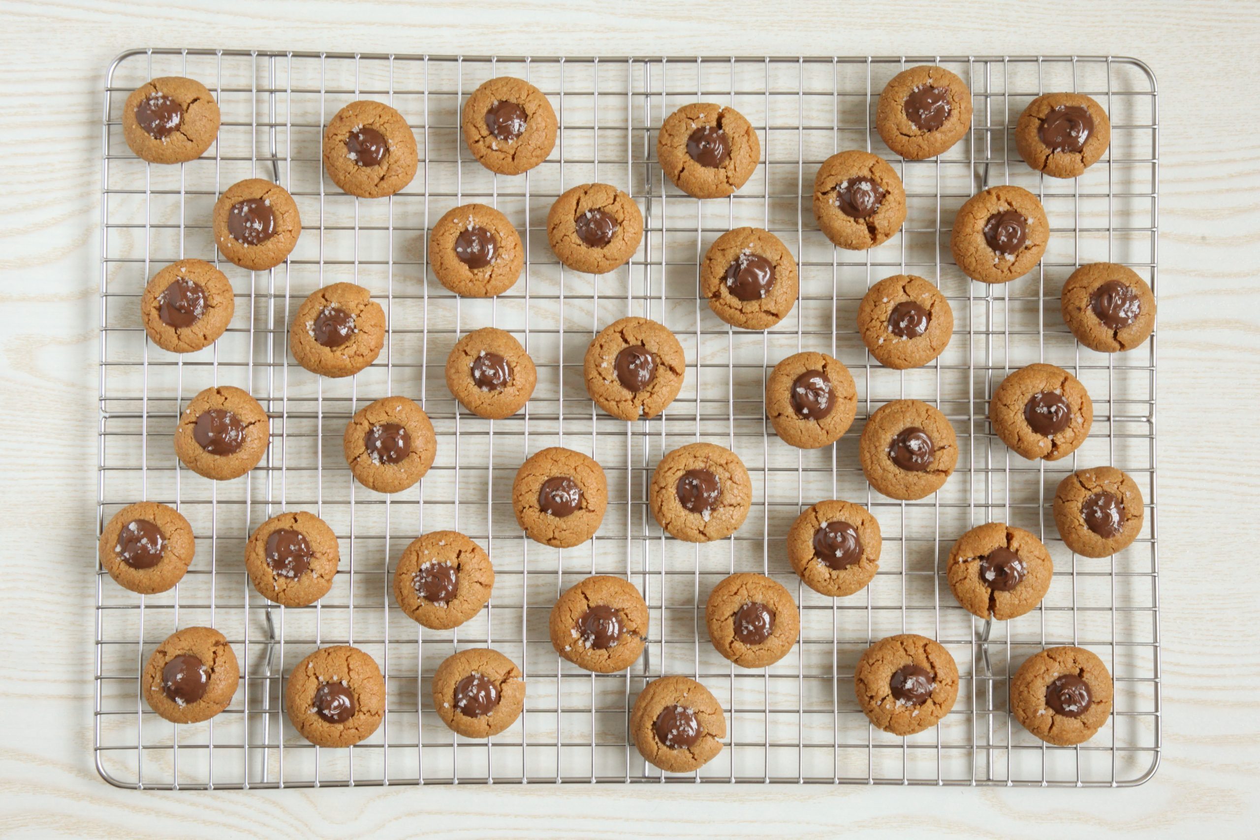 Peanut Butter Thumbprint Cookies on a cooling rack