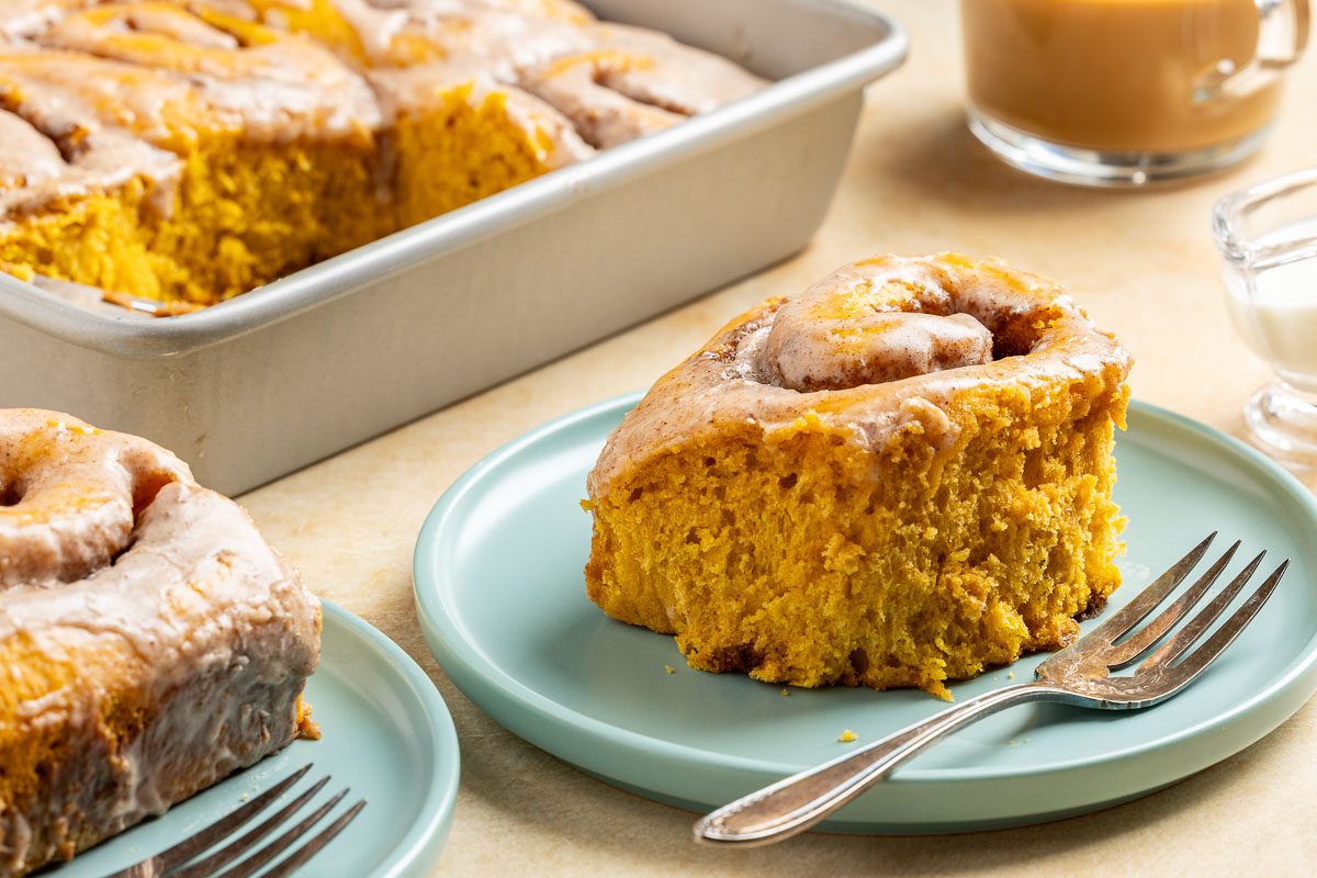 Taste of Home Pumpkin Cinnamon Rolls recipe photo of the finished recipe served on plates.