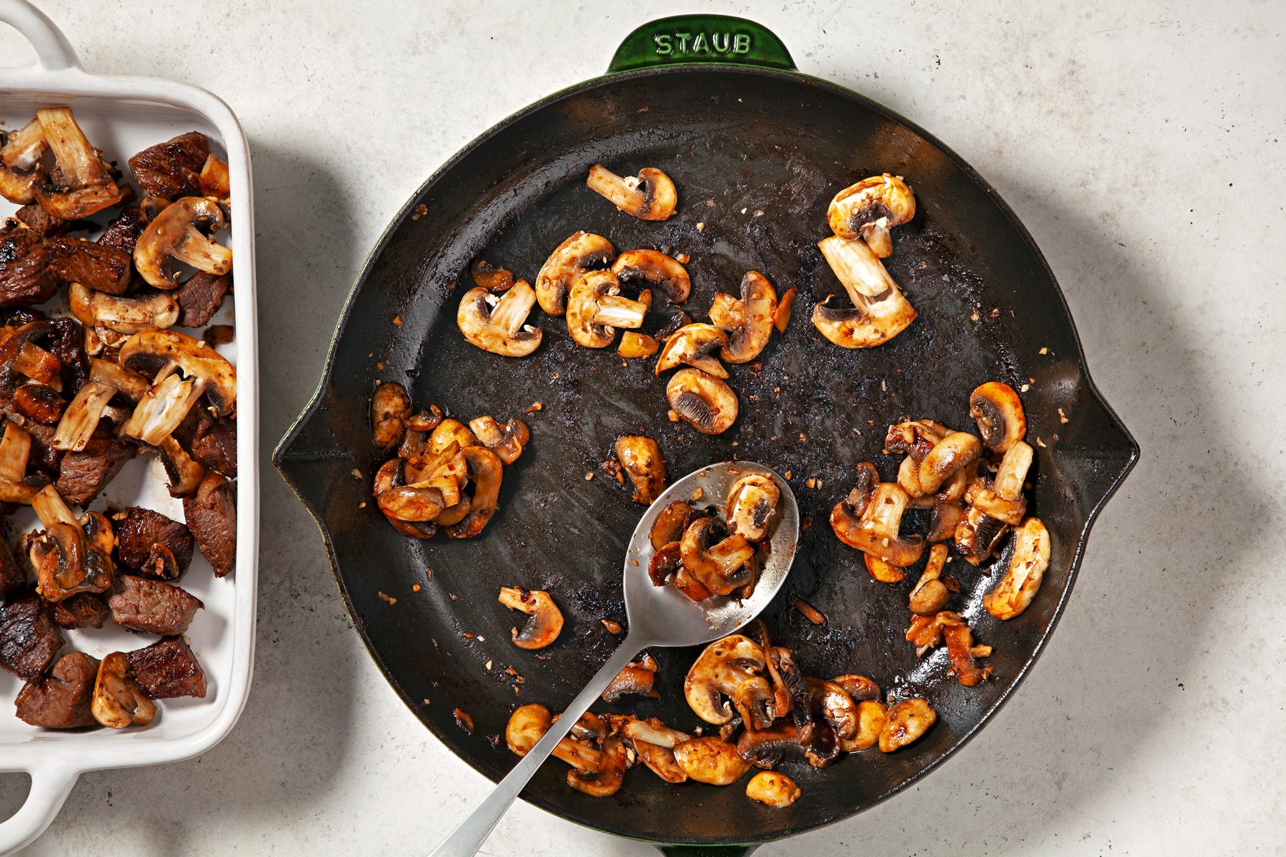 saute mushrooms until tender in the skillet; overhead shot