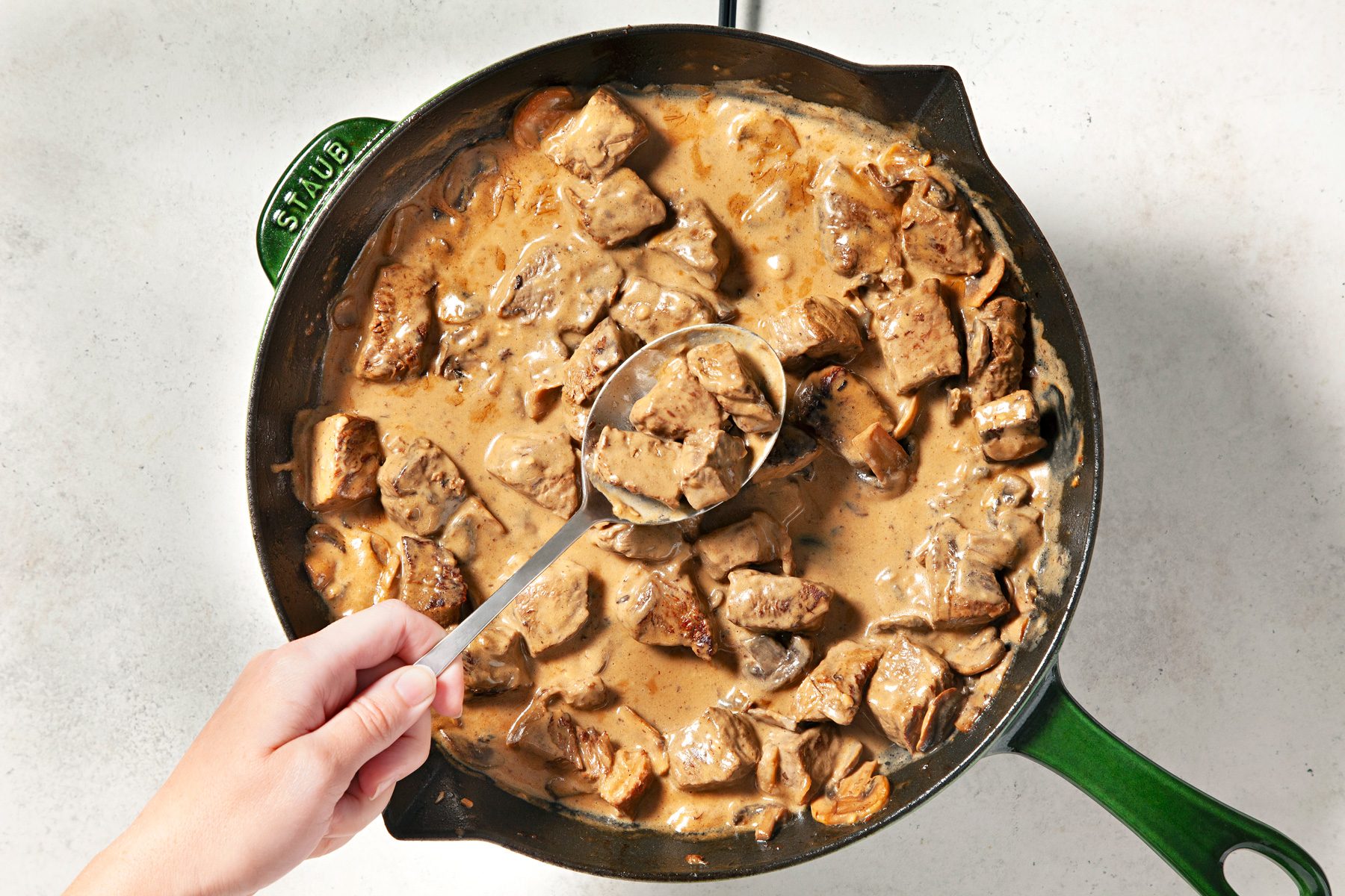 Cook over medium heat until thickened and bubbly, stirring constantly. Add beef mixture.