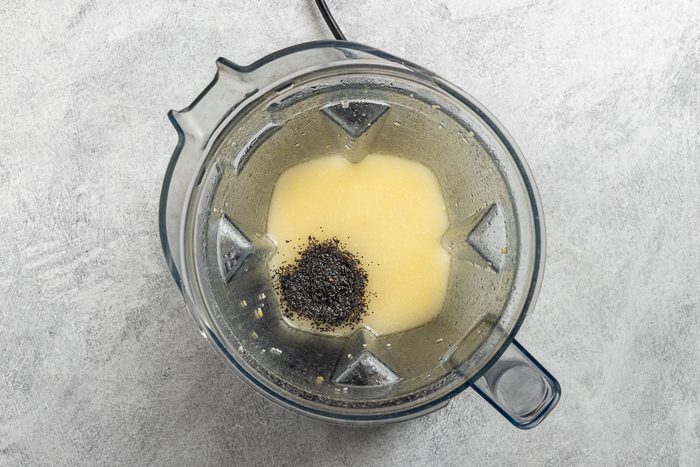 Taste of Home Strawberry Chicken Salad recipe photo of the dressing in a blender with the poppy seeds.