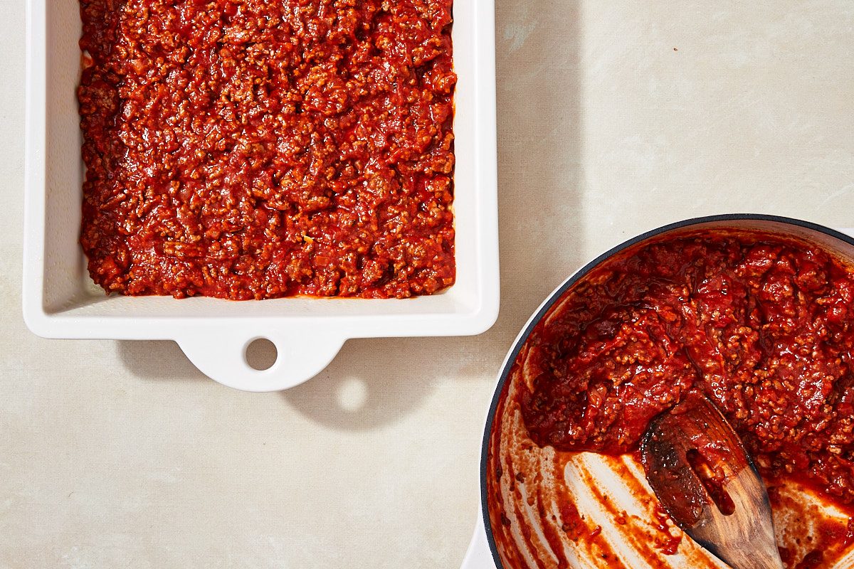 String Cheese Manicotti Step 3- finished sauce in skillet + half of sauce in 9x13" dish