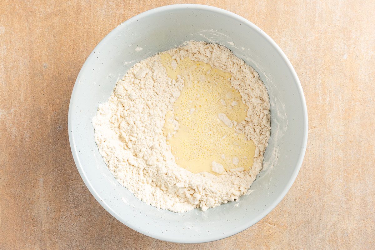 Taste of Home Apple Danish recipe photo of adding the egg yolk and milk.