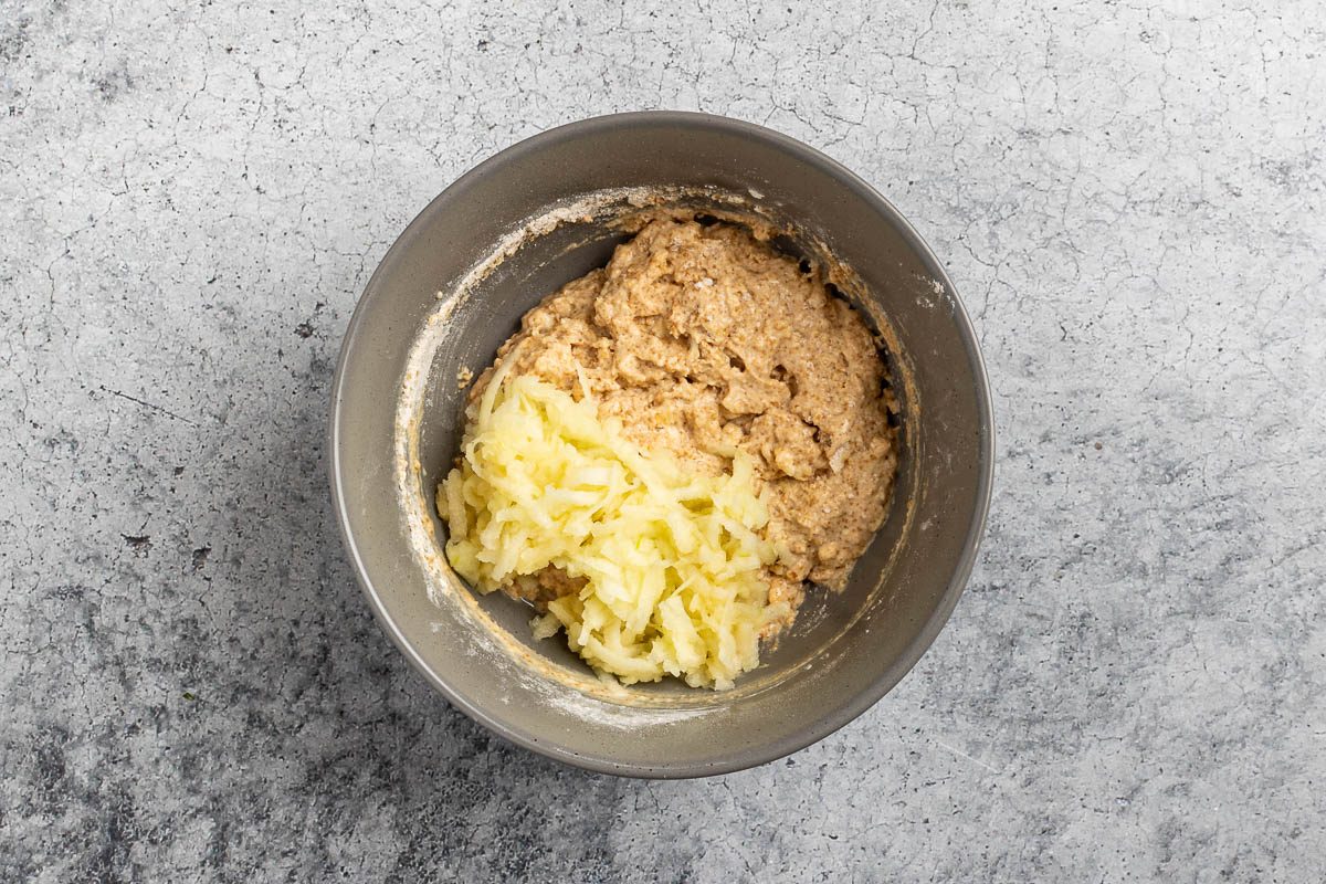 Taste of Home Apple Scones recipe photo of combining the apple into the scone ingredients.