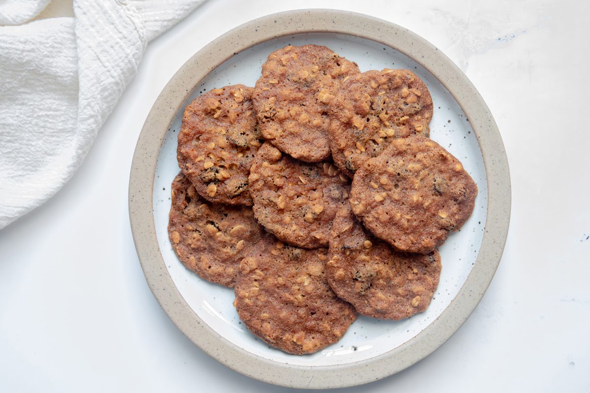 Overhead shot for Taste of Home Apple Butter Cookies on a plate on a marble surface.