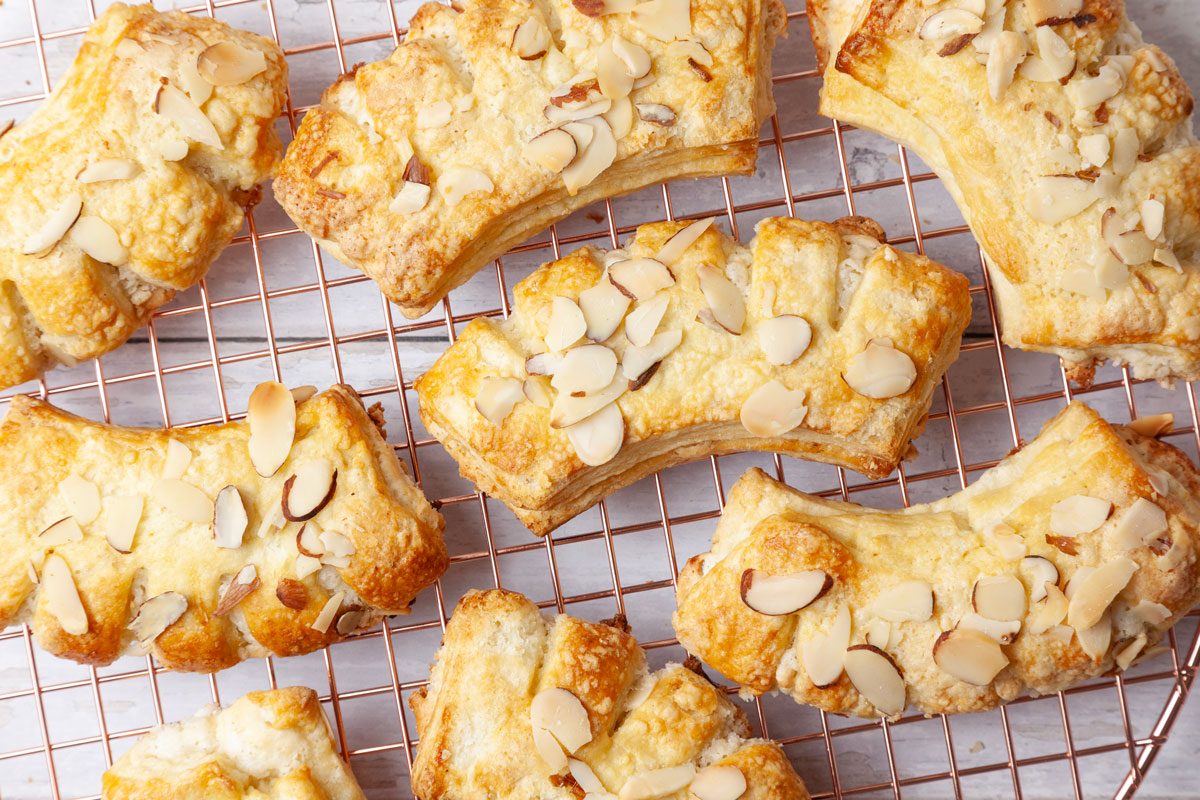 Close up of full yield of Taste of Home Bear Claw on a copper cooling rack