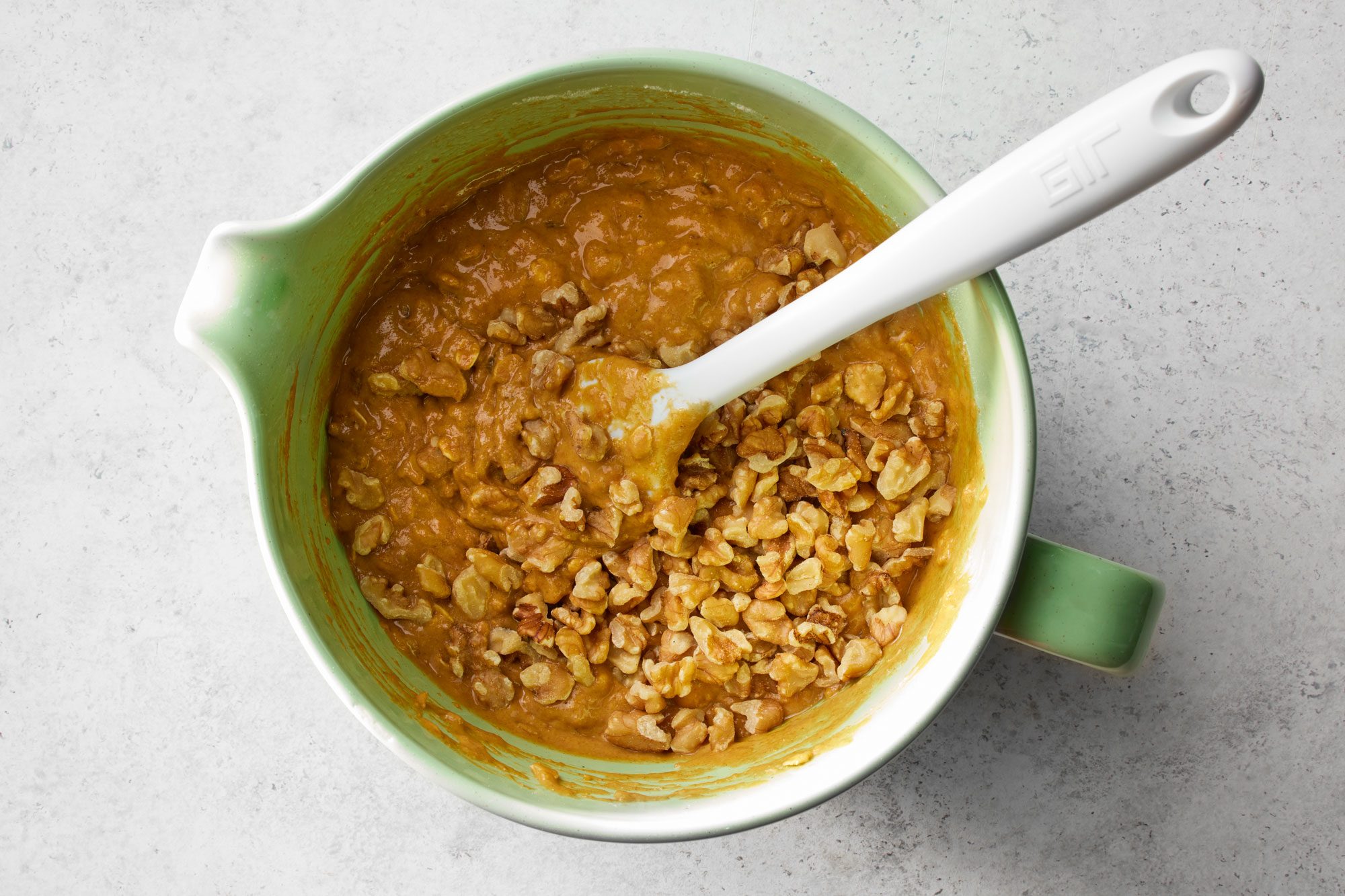 Stir in the nuts, dates or raisins.