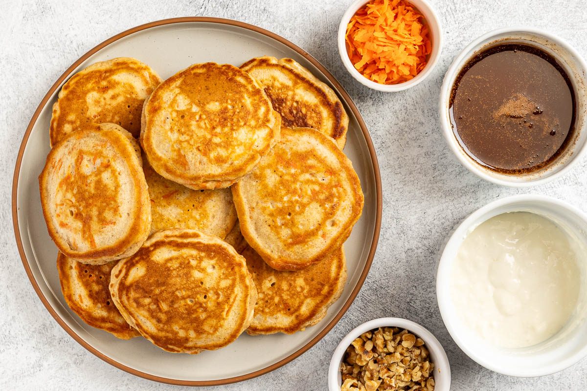 Taste of Home Carrot Cake Pancake recipe photo of the pancakes with the toppings.