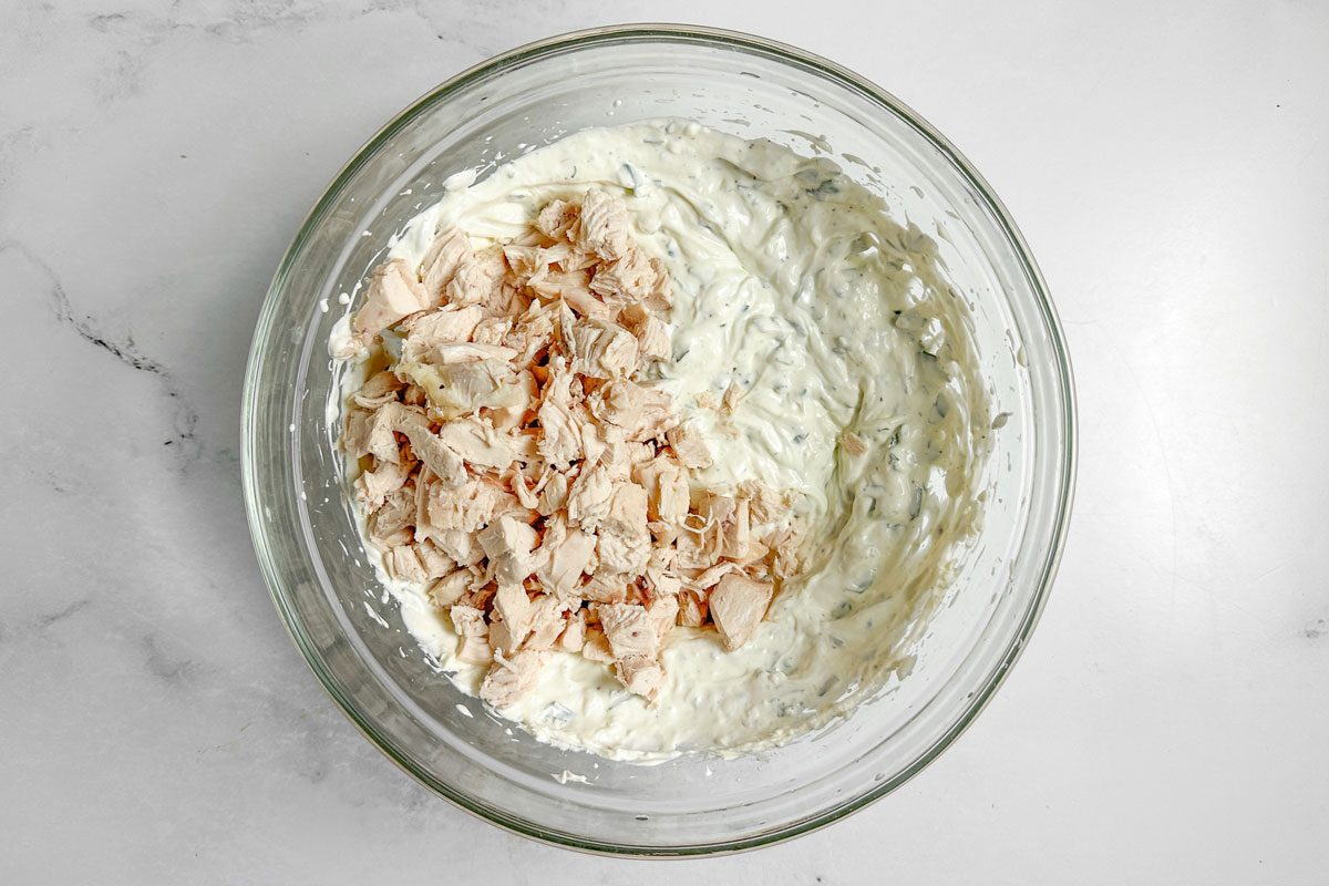 Filling ingredients for Taste of Home Chicken Manicotti in a glass bowl