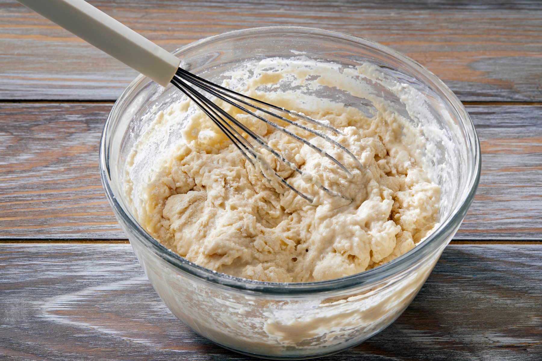 3/4th shot; wooden background; Added to flour mixture; stired just to moisten