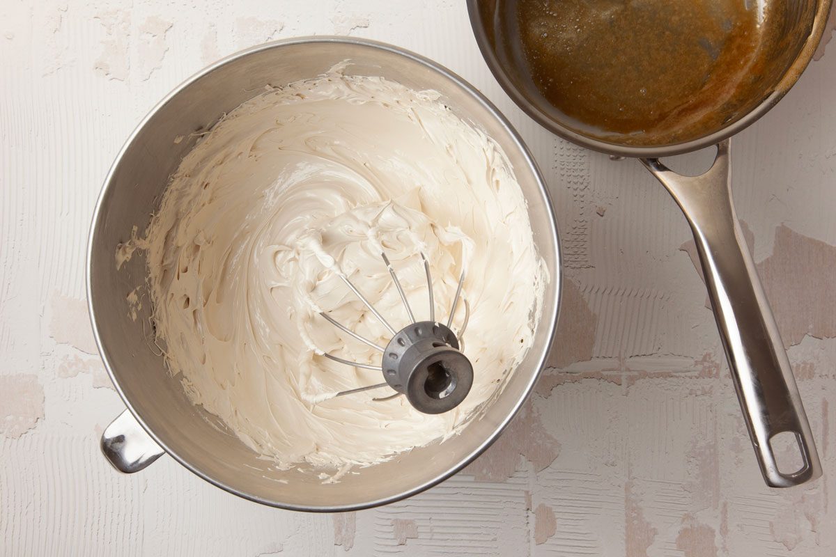 Step 5 of Taste of Home Chocolate Peanut Butter Cupcakes is to combine the brown sugar, egg whites, salt and cream of tartar over low heat. With a hand mixer, beat on low speed for one minute. Continue beating on low over low heat until the frosting reaches 160°, 8 to 10 minutes. Pour the mixture into a large bowl, then add the vanilla. Beat on high until stiff peaks form, about five minutes.