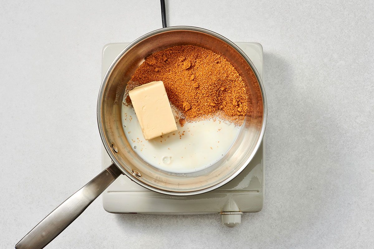 Brown sugar milk and butter in a saucepan before being combined 