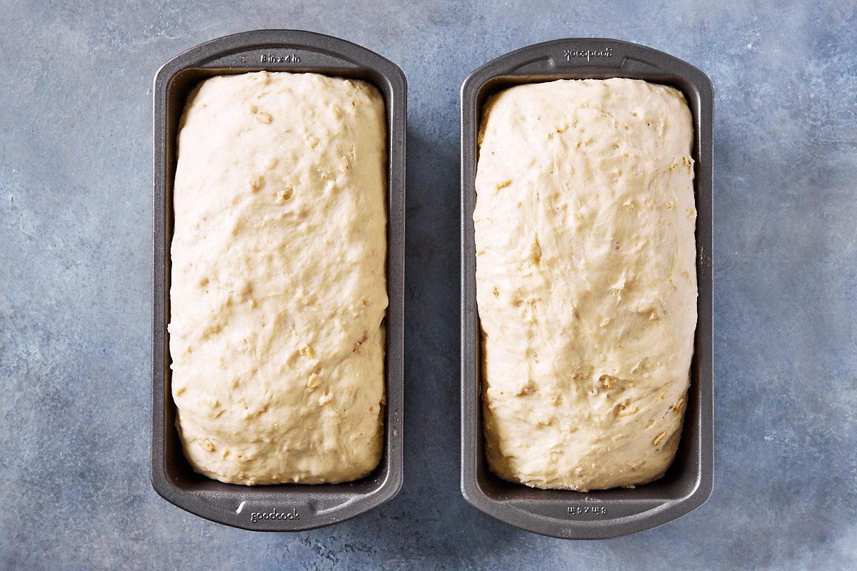 Honey Oat Bread Step 5- dough in loaf tins after second rise
