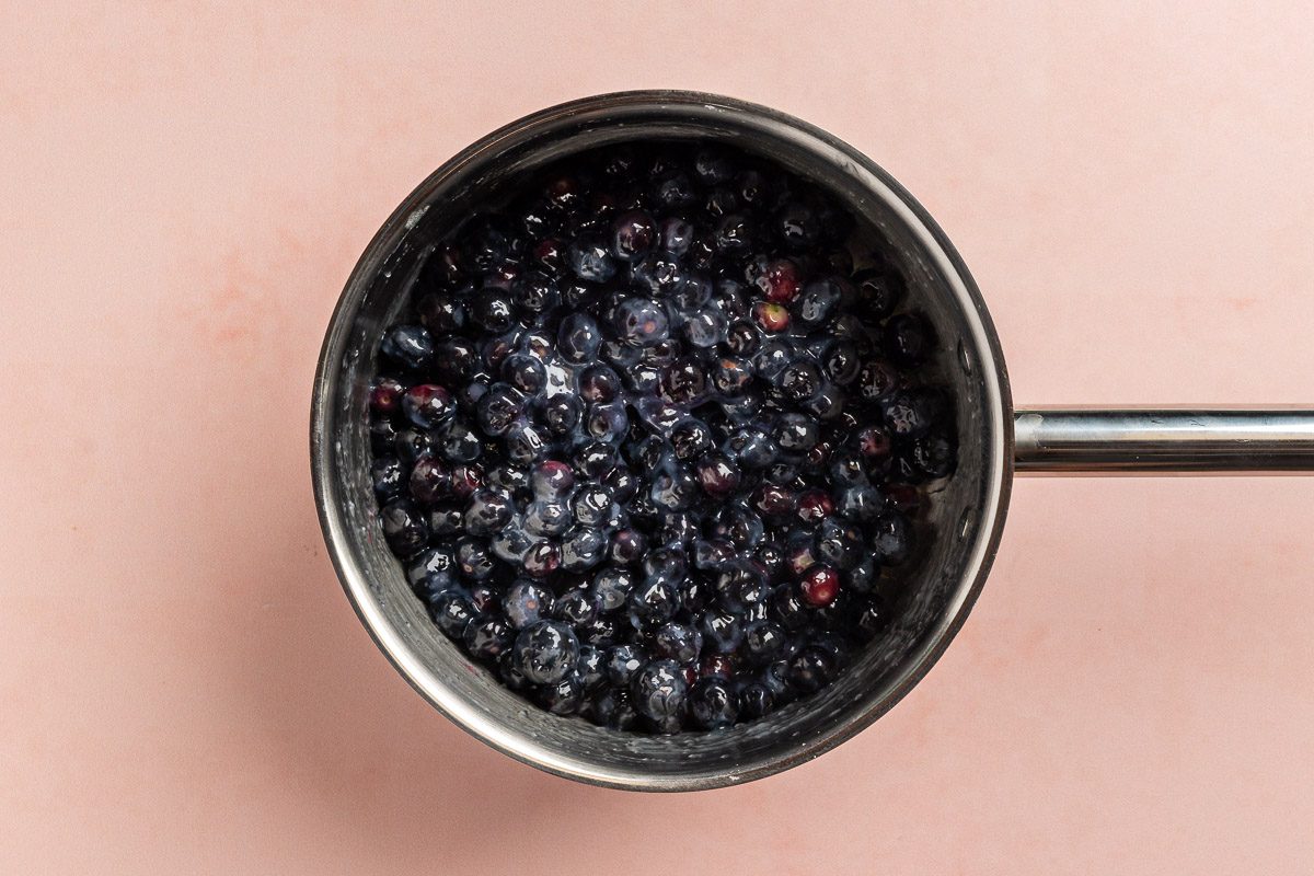 Taste of Home No Bake Blueberry Pie recipe photo of blueberries added to the saucepan.