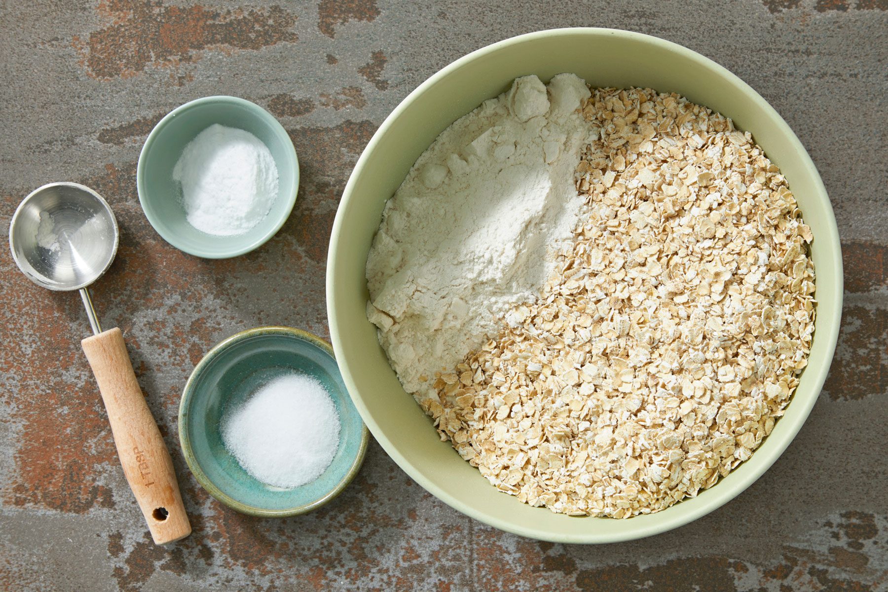 Oats, all-purpose flour, baking soda and salt combined in a bowl.