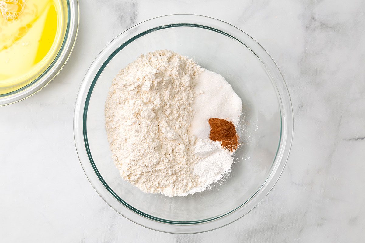 Flour, sugar, baking powder, cinnamon and salt in a mixing bowl