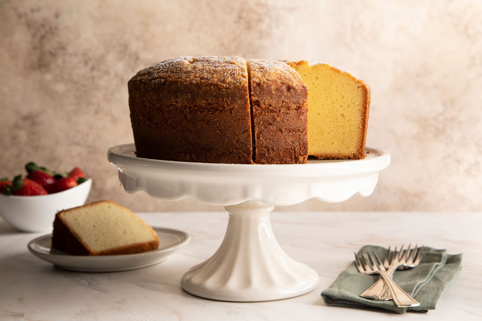 Pound Cake on a cake stand sliced