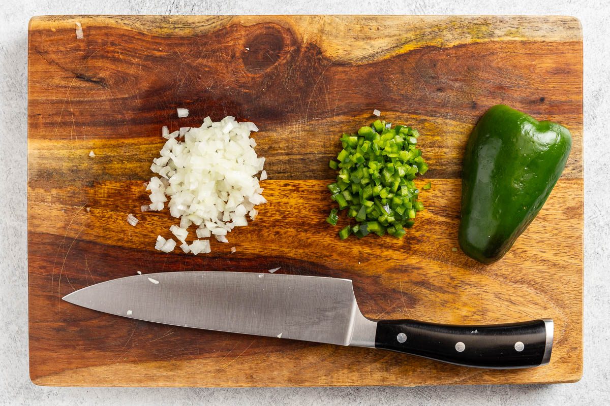 Taste of Home Salmon Omelet recipe photo of the diced onion and green pepper.