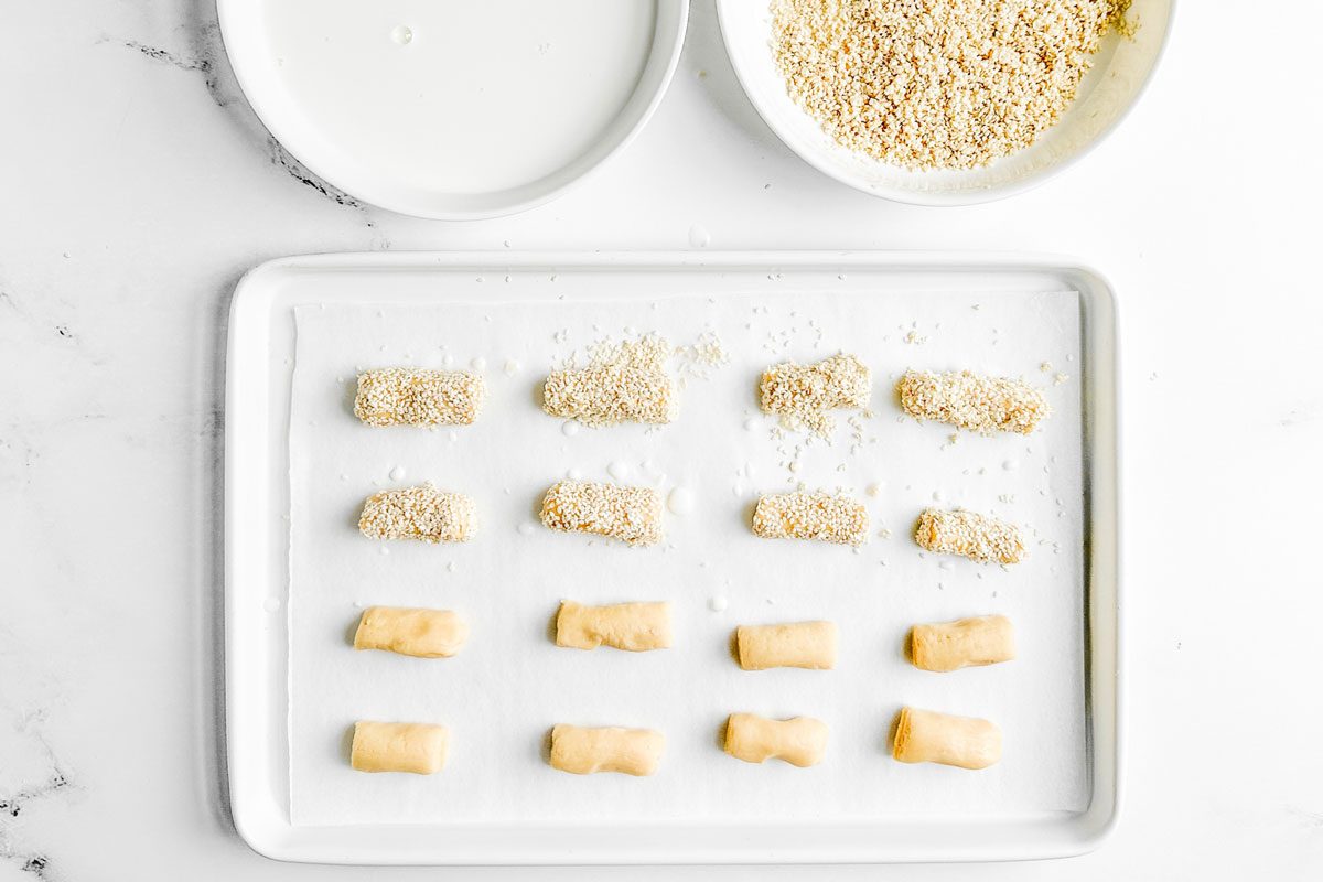 Taste of Home Sesame Cookies on a white baking sheet