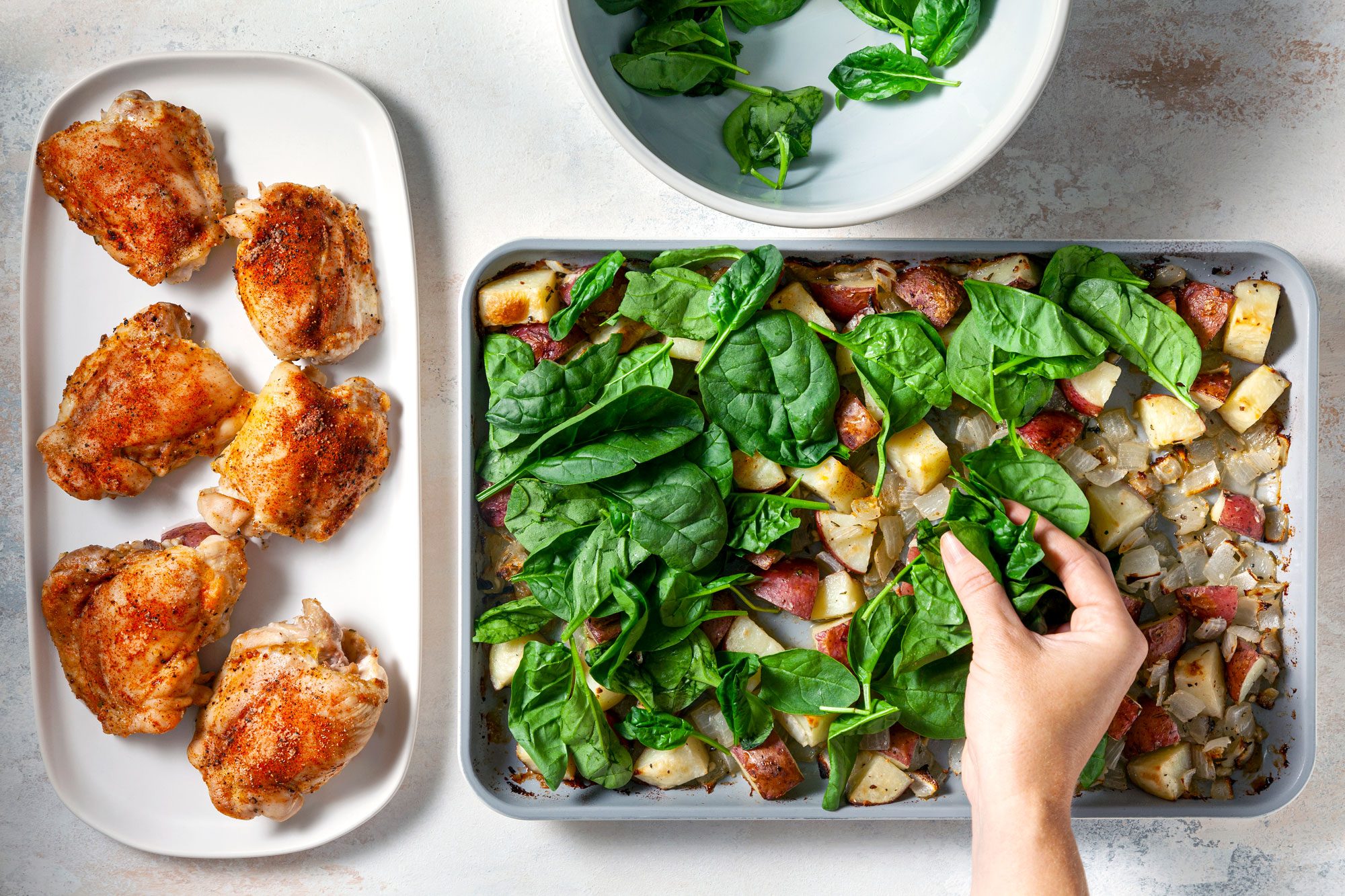 Top vegetables with spinach and Roast until vegetables are tender and spinach is wilted