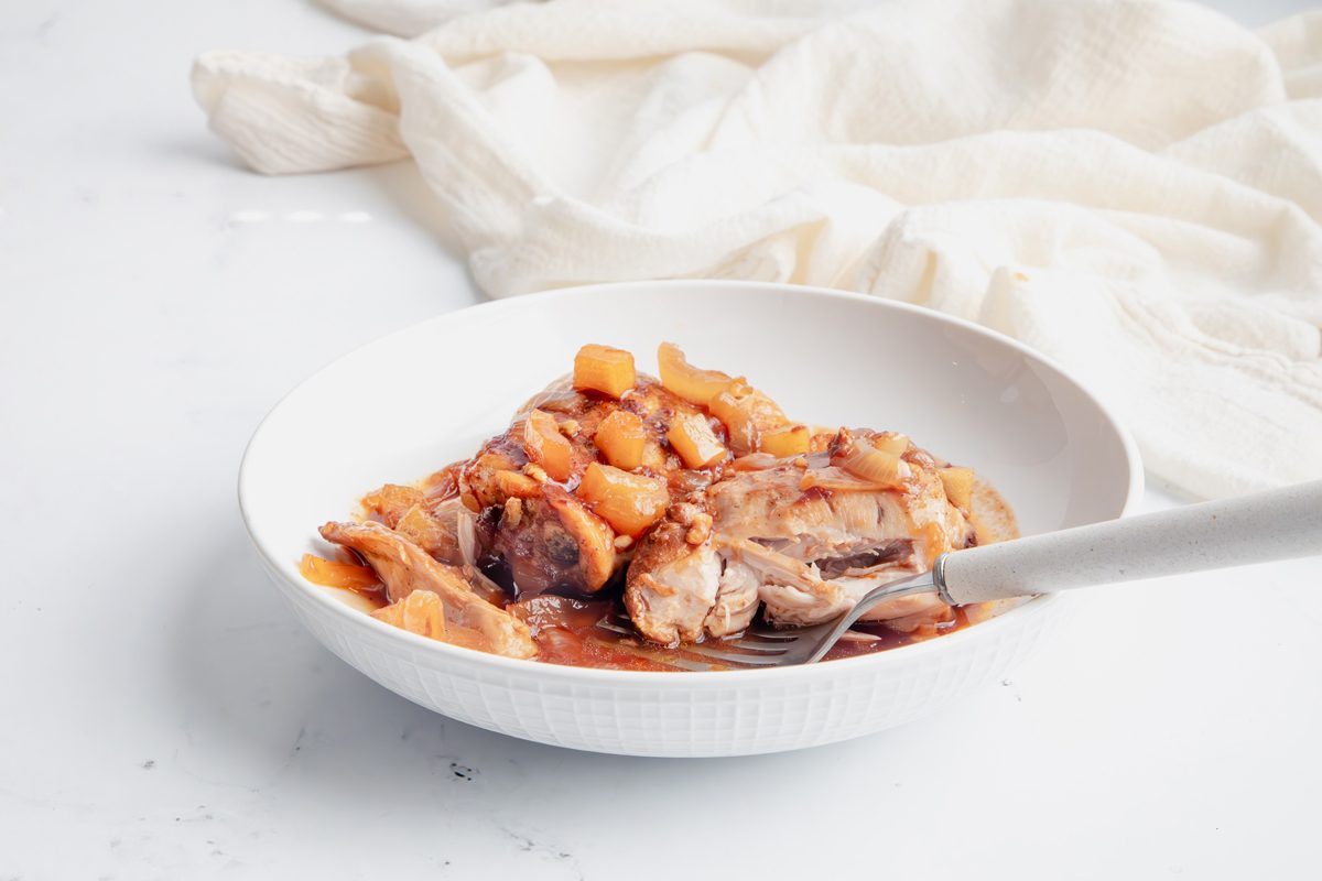 Close up beauty shot for Taste of Home Apple Chicken being served in a bowl.