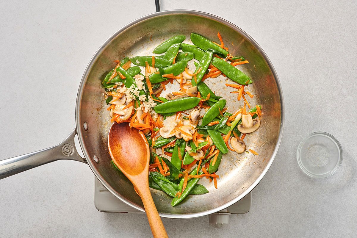 Cooked vegetables in a large skillet