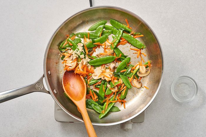 Cooked vegetables in a large skillet