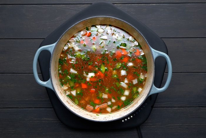 Boiling the mixture in large saucepan