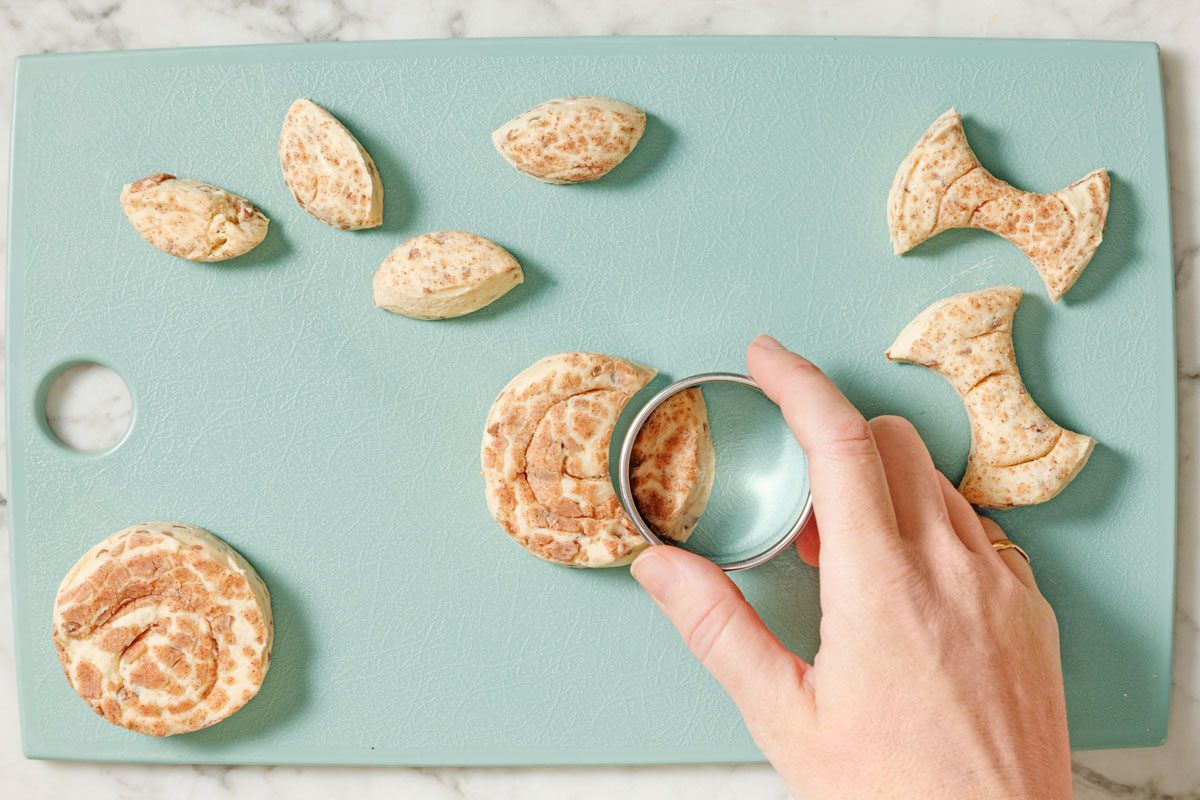 cutting the rolls to form ears and bow ties
