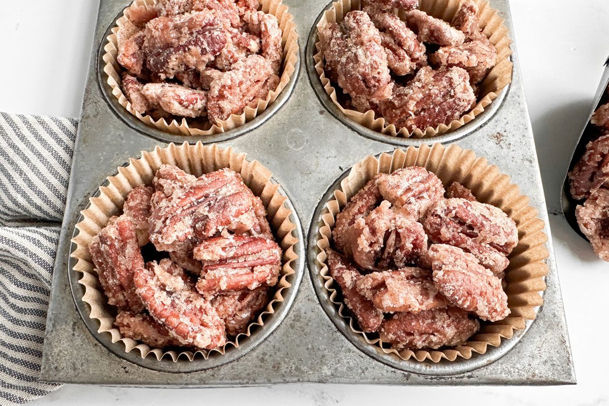 Taste of Home Candied Pecans in a vintage muffin tin