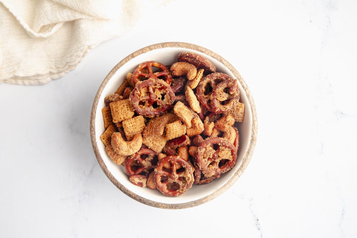 Close up beauty shot for Taste of Home Caramel Chex Mix in a small bowl.