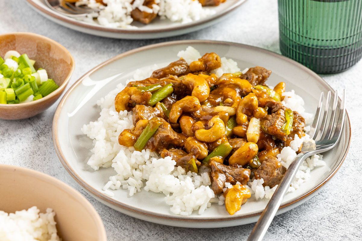 Taste of Home Cashew Beef photo of the finished recipe served over rice.