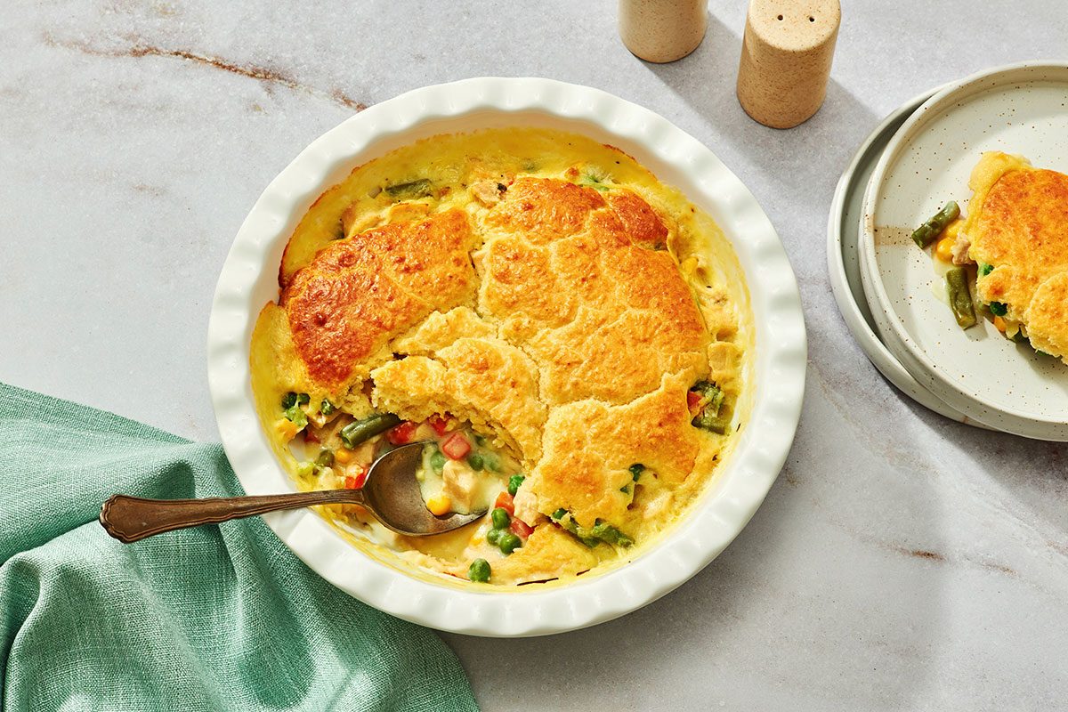 Cooked pot pie with a portion removed