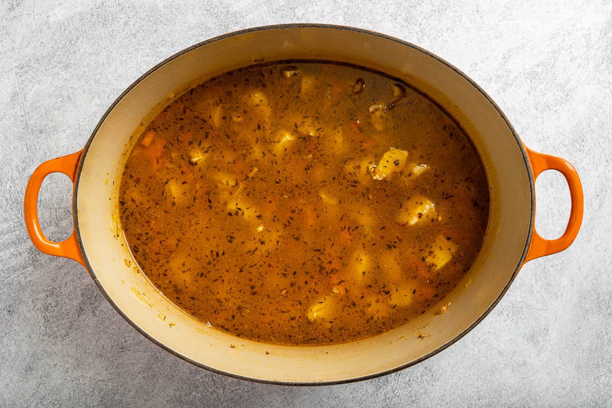 Taste of Home Chicken Lentil Soup photo of adding the spices, stock and lentils.